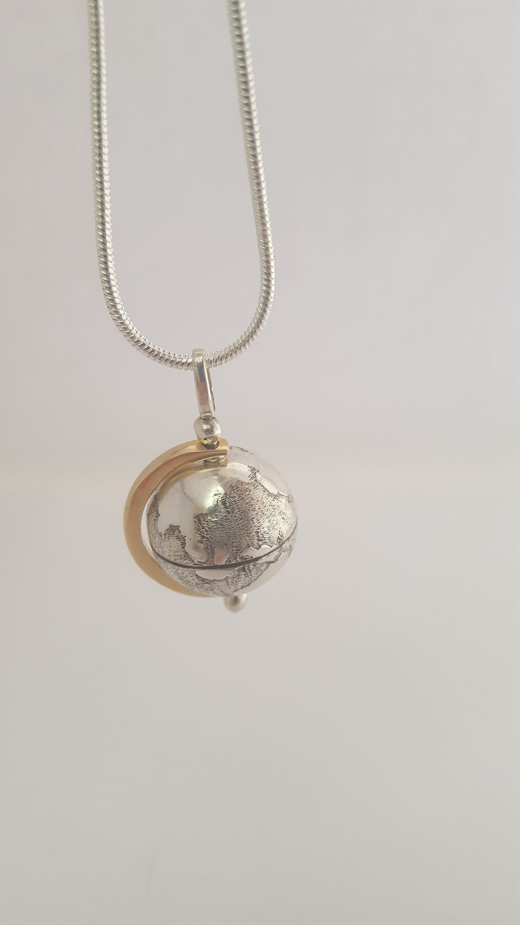 Silver globe pendant deals