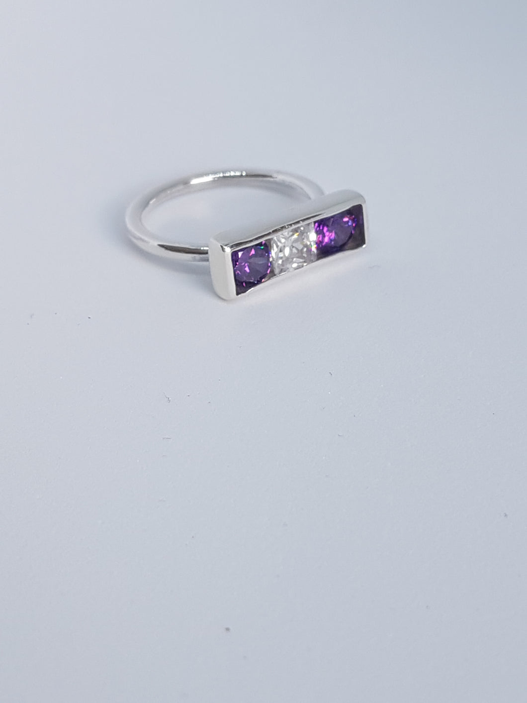 Sterling silver ring with purple& clear cubic zirconia