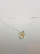Sold!Sterling silver & 9ct gold square pendant