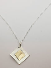 Sterling silver & 9ct gold diamond shaped pendant
