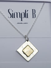 Sterling silver & 9ct gold diamond shaped pendant