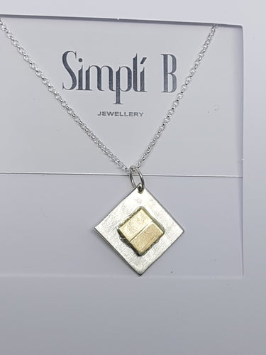 Sterling silver & 9ct gold diamond shaped pendant