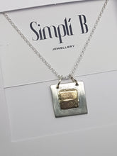 Sold!Sterling silver & 9ct gold square pendant