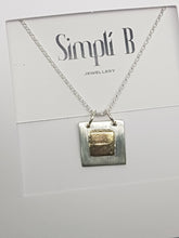 Sold!Sterling silver & 9ct gold square pendant