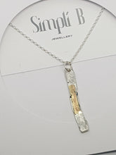 Sold!sterling silver & 9ct gold hammer textured pendant
