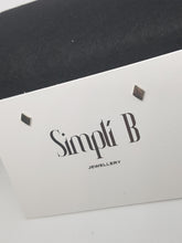 Sterling silver flat diamond shaped stud earrings