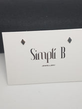 Sterling silver flat diamond shaped stud earrings