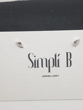 Sterling silver quarter dome hammer textured stud earrings
