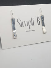 Sterling silver half hammer textured curved drop earrings
