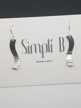 Sterling silver S shaped half hammer textured curved drop earrings