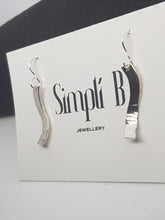 Sterling silver S shaped half hammer textured curved drop earrings