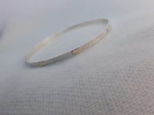 Sterling silver hammer textured bangle with 9ct gold accents