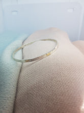 Sterling silver hammer textured bangle with 9ct gold accents