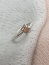 Sterling silver ring with a 9ct gold accent