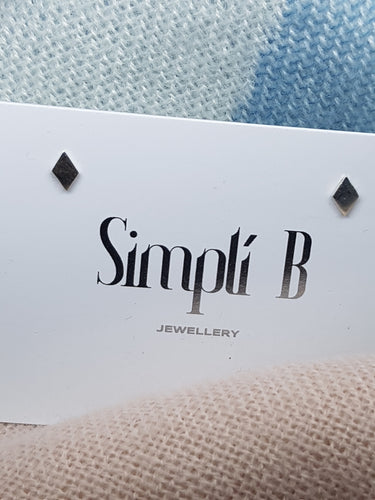 Sterling silver flat diamond shaped stud earrings