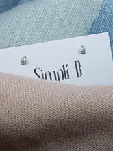 Sterling silver quarter dome hammer textured stud earrings