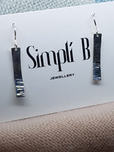 Sterling silver half hammer textured curved drop earrings