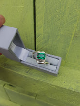 Sterling silver ring set with an emerald green cubic zirconia