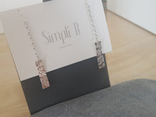 Long hammered sterling silver drop earrings on chain