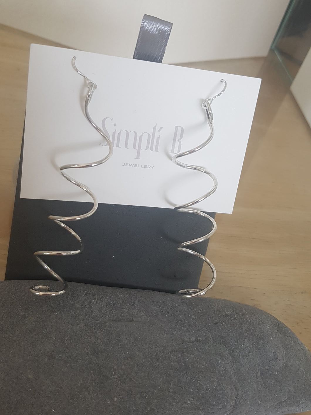 Long sterling silver spiral drop earrings
