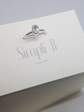 Sterling silver ring set with a clear cubic zirconia
