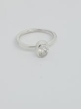 Sterling silver ring set with a clear cubic zirconia