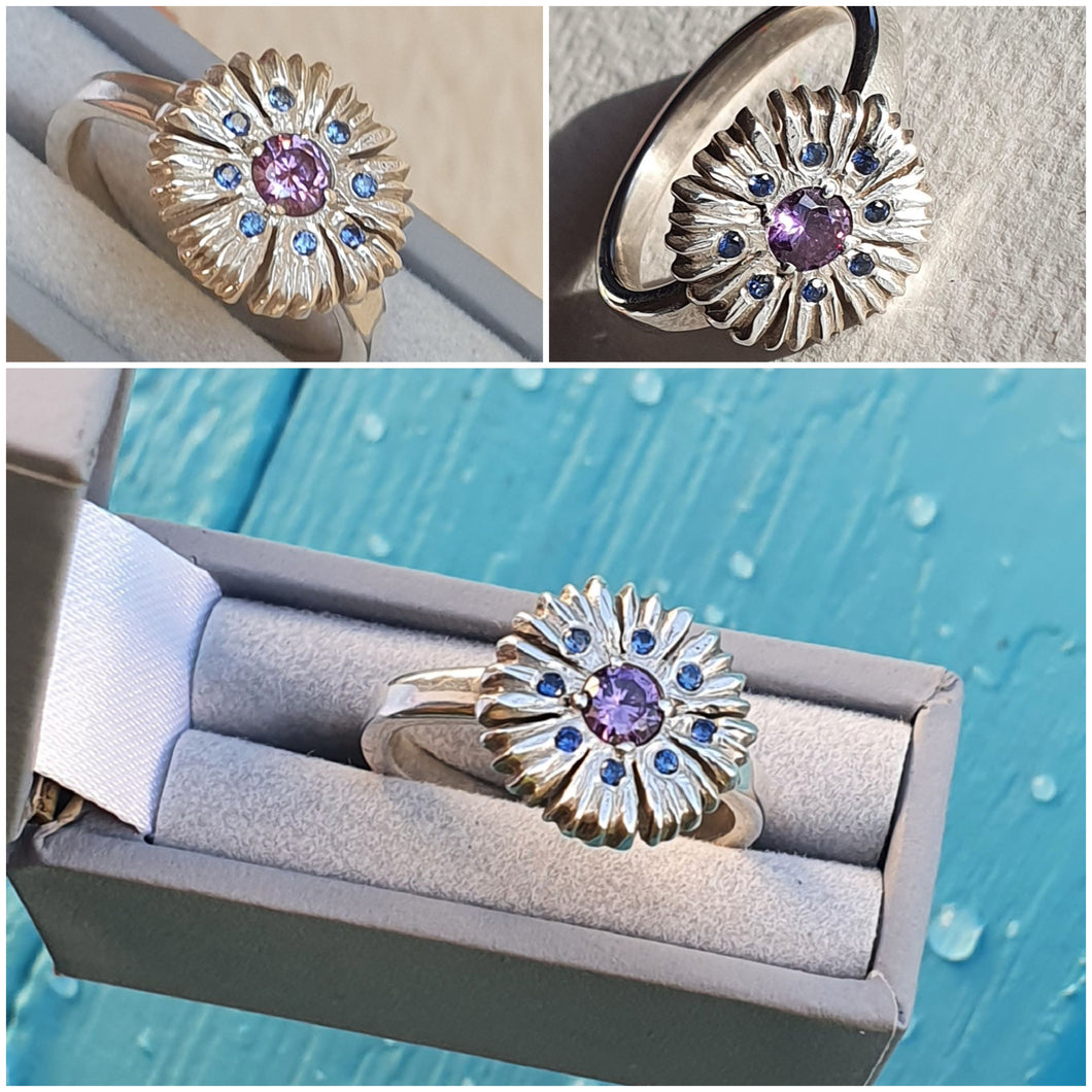 925 Sterling Silver Cornflower ring set with synthetic sapphires.