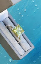 Sterling silver ring set with lemon peridot cubic zirconia