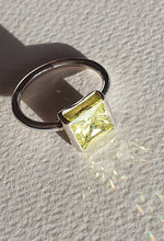 Sterling silver ring set with lemon peridot cubic zirconia