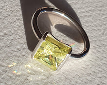 Sterling silver ring set with lemon peridot cubic zirconia